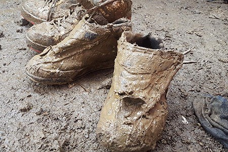 A muddy boot for a muddy course